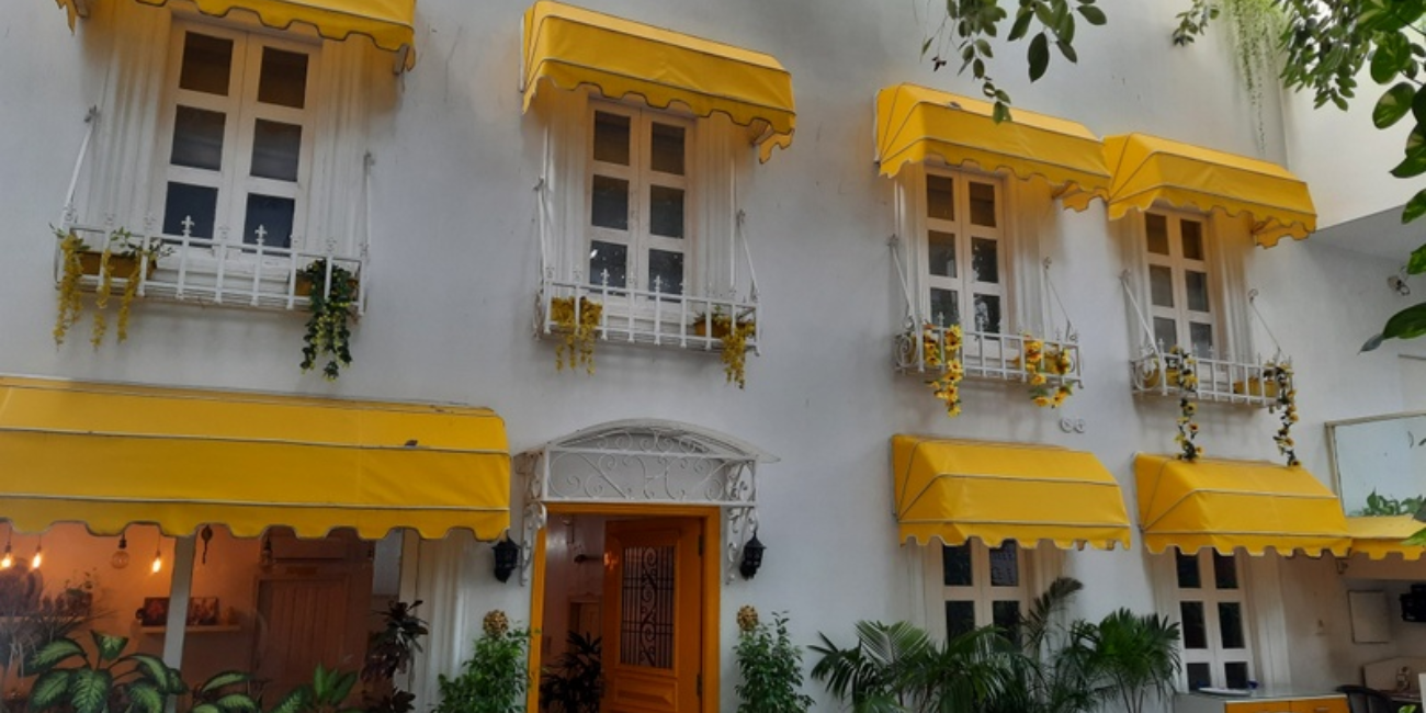 Stay banras hotel in the vibrant heart of the city, with busy streets and urban life all around.